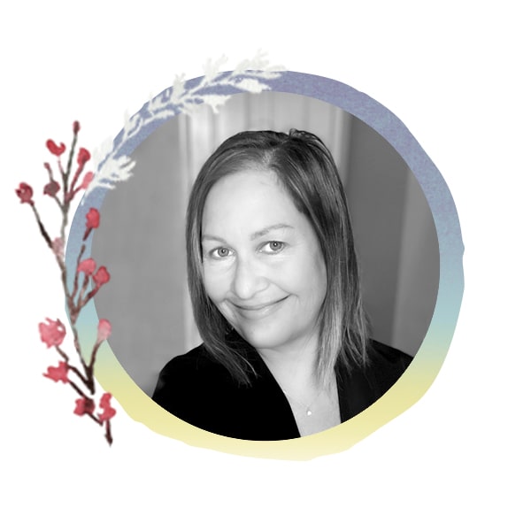 Headshot of Staff Member Kristy with seasonal art frame