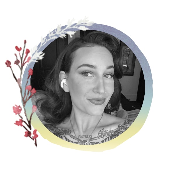 Headshot of Staff Member Sam with seasonal art frame