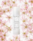 Beauty shot of Chantecaille Vital Essence 50 ml with flowers in the background