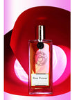 Parfums de Nicolai Rose Pivoine Eau de Toilette 100 ml with red swirl behind bottle