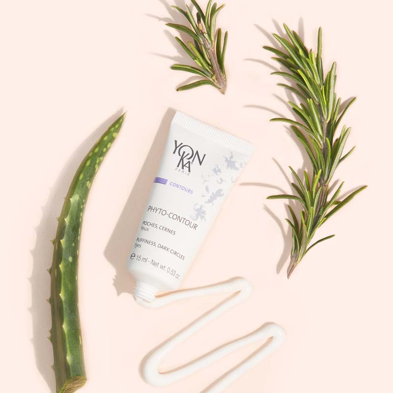 Yon-Ka Paris Phyto-Contour (15 ml) lifestyle shot of tube swatch and rosemary and aloe in the background