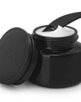 Argentum Apothecary La Potion Infinie Hydrating Cream 2.46 oz opened with black small spatula in cream