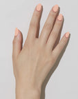 Model with light skin tone wearing JINsoon Nail Lacquer - Nostalgia