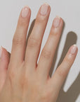 Model with light skin tone wearing JINsoon Nail Lacquer - Muse