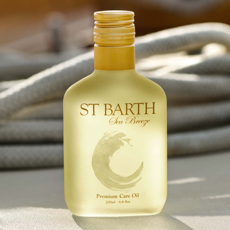 Beauty shot of Ligne St. Barth Premium Care Oil 6.8 oz with ropes in the background