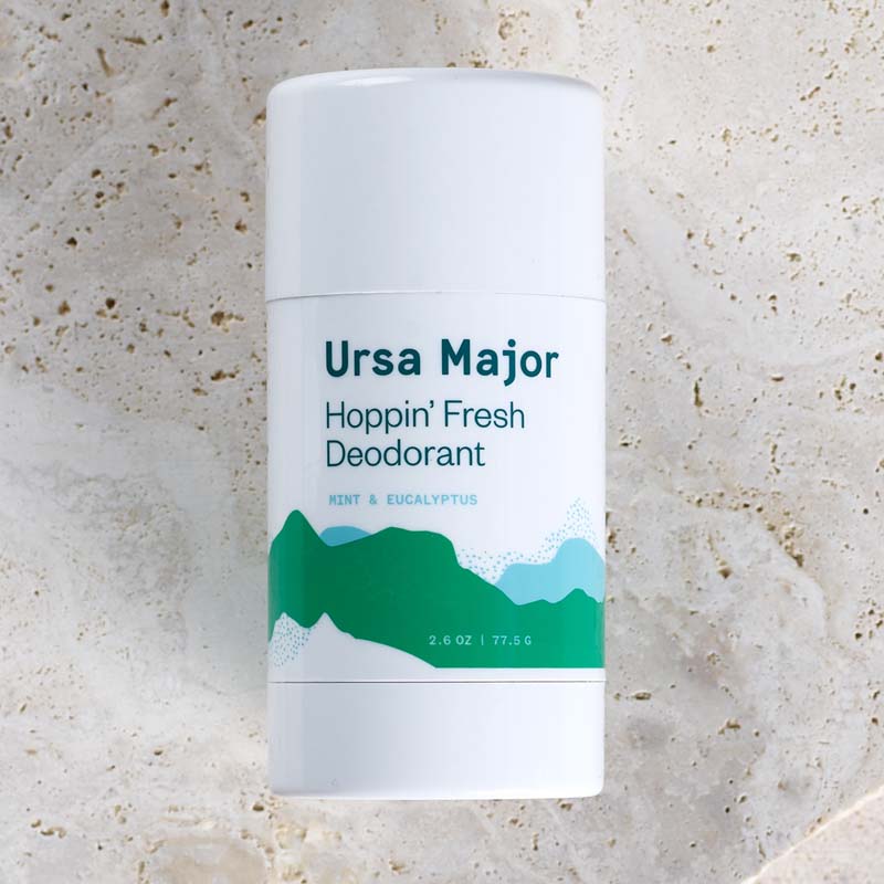 Ursa Major Hoppin' Fresh Deodorant - 2.6 oz shown top view with stone in the background