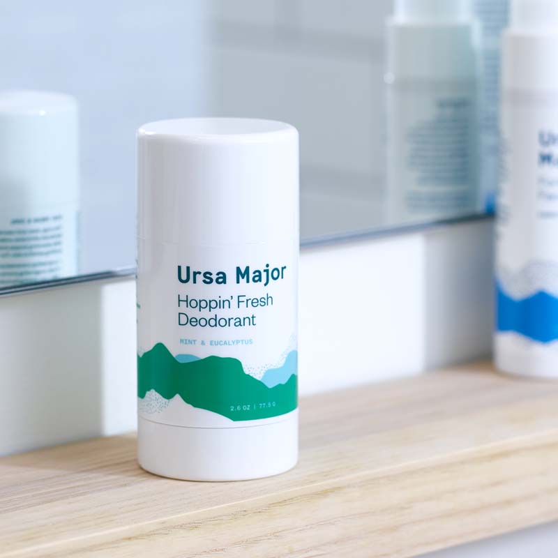 Lifestyle shot of Ursa Major Hoppin' Fresh Deodorant - 2.6 oz on bathroom shelf