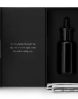 Argentum Apothecary L'Etoile Infinie Enhancing Day & Night Face Oil box open with bottle inside (1 oz)
