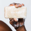 Ursa Major Hoppin' Fresh Bar Soap (5 oz) - Close up shot of model holding a soapy bar