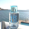 Solinotes Paris Fleur d'Iris (Iris Flower) Eau De Parfum beauty shot of bottle with a lake in background