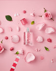 Solinotes Paris Rose Eau De Parfum beauty shot on pink background with roses and petals around