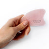 Odacite Crystal Contour Gua Sha Rose Quartz Beauty Tool 1 pc in hand