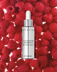 Beauty shot of Chantecaille Bio Lifting Serum Plus with raspberries in the background