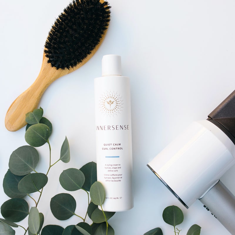 Beauty shot of Innersense Organic Beauty Quiet Calm Curl Control 10 oz with brush and hairdryer (not included with purchase)
