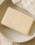 Minois Paris Savon Doux (Gentle Soap) (100 g) bar shown without outer wrapper on dish