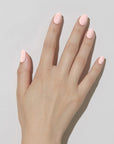 Model with light skin tone wearing JINsoon Nail Lacquer - Pinky