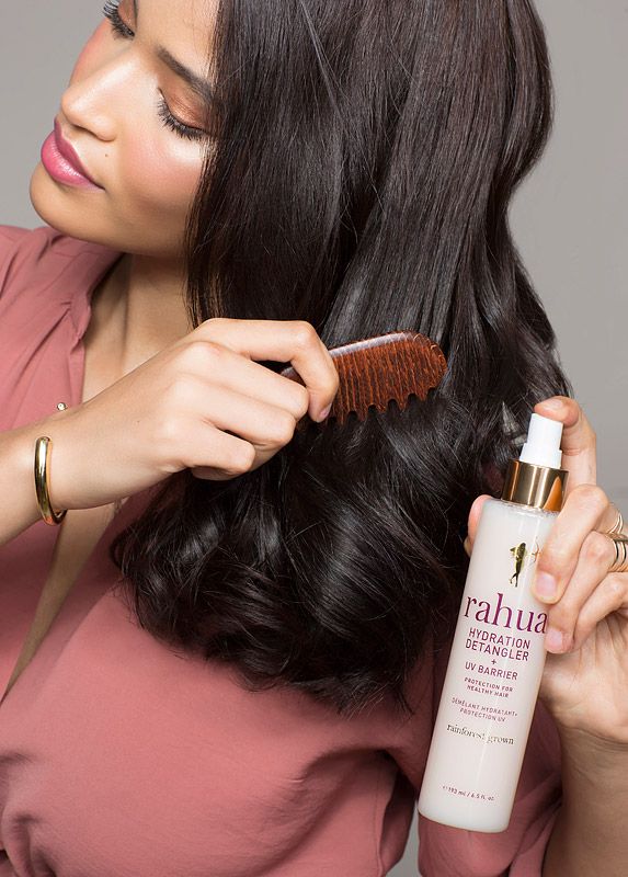 Rahua By Amazon Beauty Hydration Detangler + UV Barrier (193 ml) with woman combing hair
