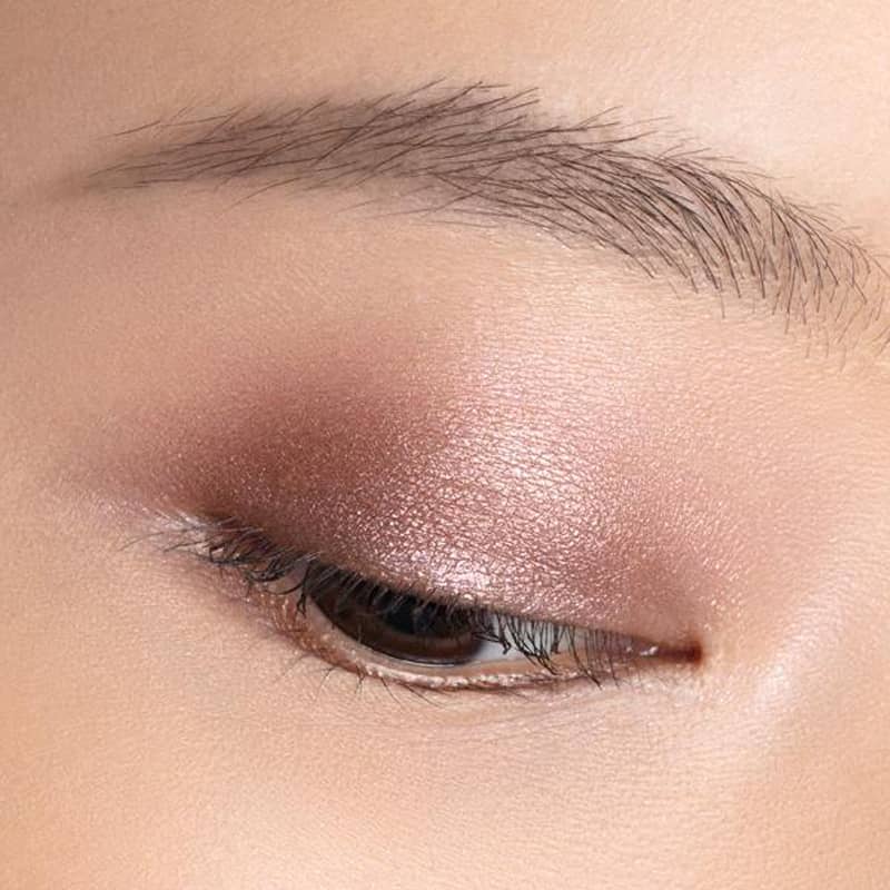 Chantecaille Luminescent Eye Shade - Pangolin shown on eyelid of model with fair skin