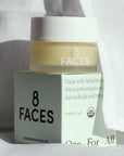 Lifestyle shot of 8 Faces Boundless Solid Oil (1.7 oz) with box