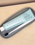 Davids Premium Natural Toothpaste - Spearmint (5.25 oz) in a tray with a toothbrush