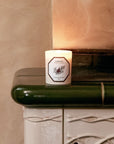 Lifestyle shot Carriere Freres Cypress Candle (185 g) on green tile