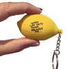 Close up of hand holding People I've Loved Lemon Stress Ball Keychain