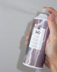 R+Co Zig Zag Root Teasing + Texture Spray (5 oz) being sprayed