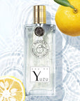 Parfums de Nicolai Eau de Yuzu beauty shot with lemons to give the feel of the fragrance