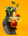 Vilhelm Parfumerie Basilico & Fellini Eau de Parfum Mood Shot with tomatoes and greenery