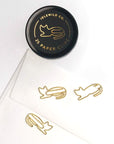 Idlewild Cat Paper Clips (25 pcs) showing 3 cat clips, one of which is clipped to an envelope