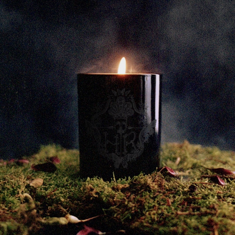 Harris Reed Charred Rose Candle (10 oz) shown burning