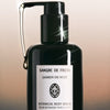 Upclose shot of Sangre de Fruta Botanical Body Serum Jasmin de Nuit (200 ml) with serum flowing from pump top