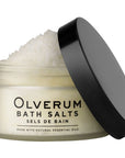 Olverum Bath Salts - jar open showing a mound of bath salts