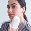 Daily Concepts Daily Facial Micro Scrubber on model's fingers
