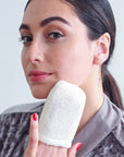 Daily Concepts Daily Facial Micro Scrubber on model's fingers