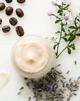 Athar’a Pure Moroccan Coffee Eye Cream beauty shot pictured with herbs and coffee beans