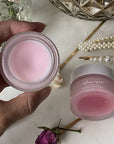 Athar’a Pure Pink Lotus Hydrating Balm lifestyle shot in model's hand