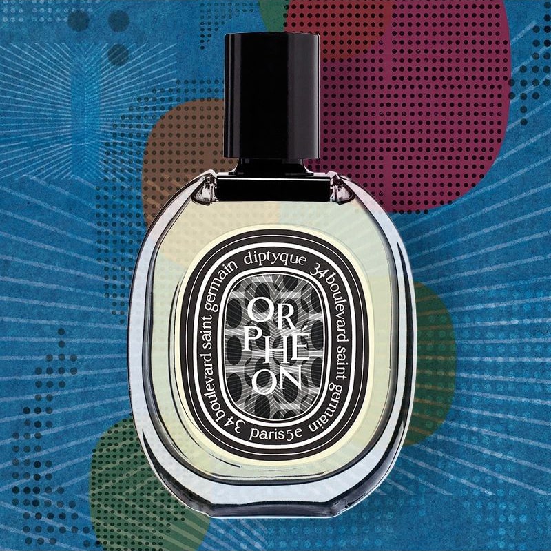 Lifestyle shot of Diptyque Orpheon Eau de Parfum (75 ml) bottle with colorful background of geometric art