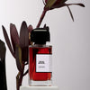 BDK Parfums Rouge Smoking Eau de Parfum with plant beside (not included)