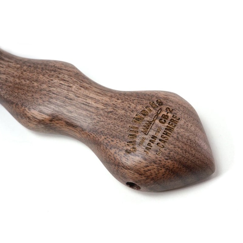 Shoji Works Cashmere Clothes Brush in Walnut - close-up of handle brand stamp