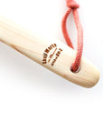 Shoji Works Long Handle Body Brush - close-up of brand imprint on handle