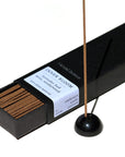 Ume Incense Inner Bloom Incense shown inserted into an incense burner (sold separately)