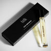 BDK Parfums Oud Abramad Eau de Parfum leaning against black box