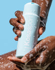 Kosas Cosmetics Good Body Skin Body Wash shown in models hand