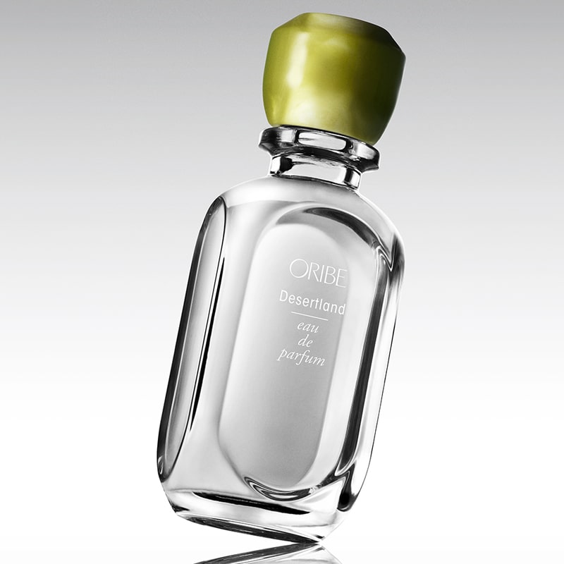Oribe Desertland Eau de Parfum with bottle tilted