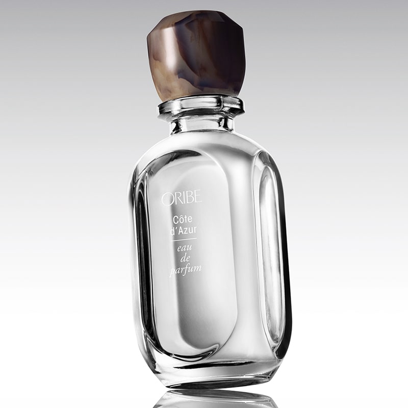 Oribe Cote d&#39;Azur Eau de Parfum - bottle tilted