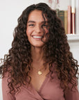 Christophe Robin Luscious Curl Cleansing Balm showing model who has used the product