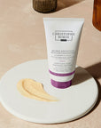 Christophe Robin Luscious Curl Defining Butter showing tube on a plate with product smear
