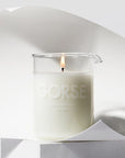 Laboratory Perfumes Gorse Candle lit candle in a beauty shot