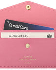 Delfonics Quitterie Card Case with Snap – Pink - shown open with 2 sample cards inserted